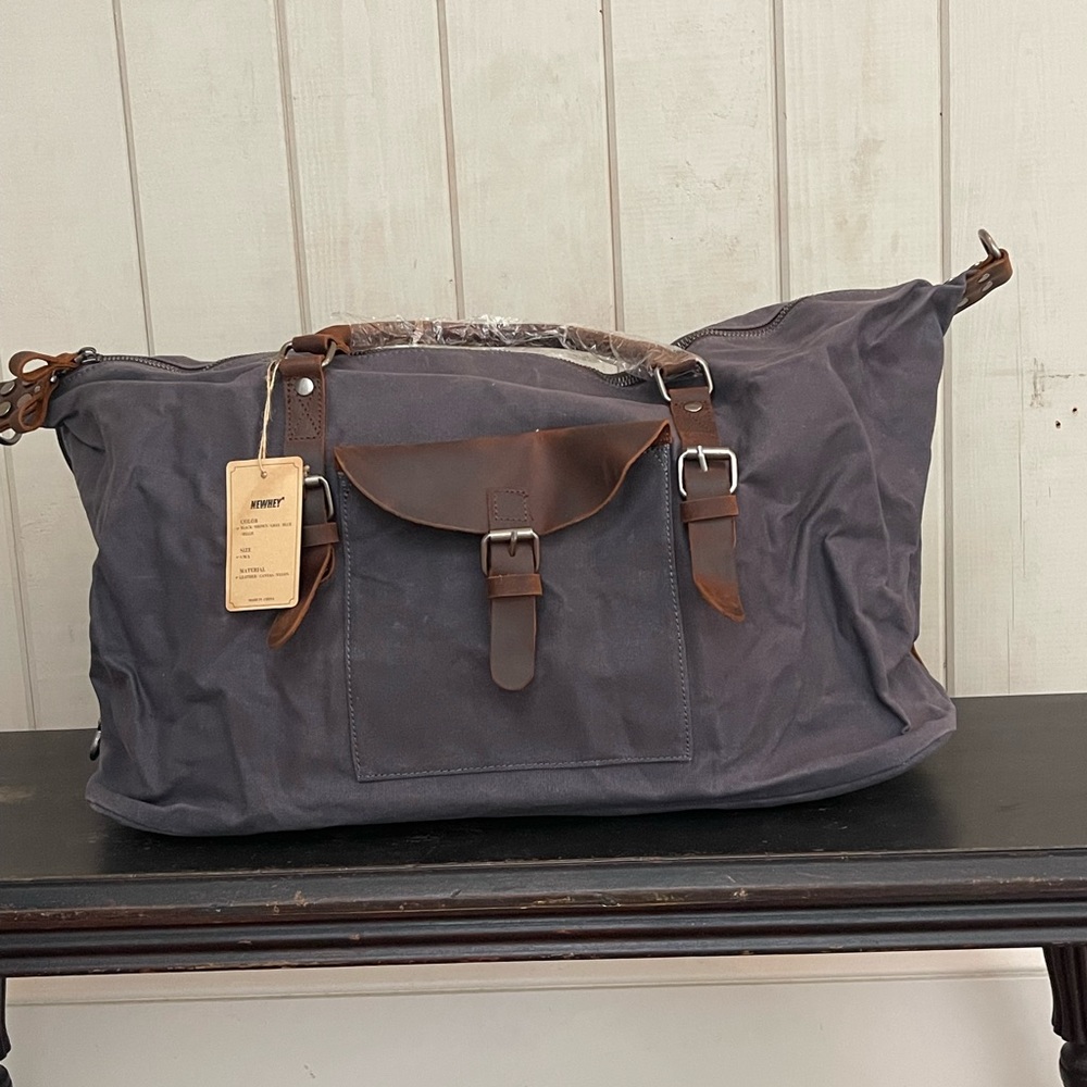 Gray Cavas/Leather Weekend BAG with leather handles&removable/adjustable strap.
